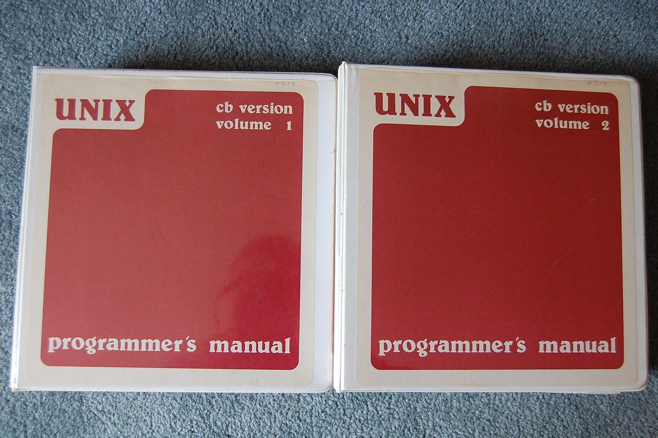 Photo of two UNIX manuals